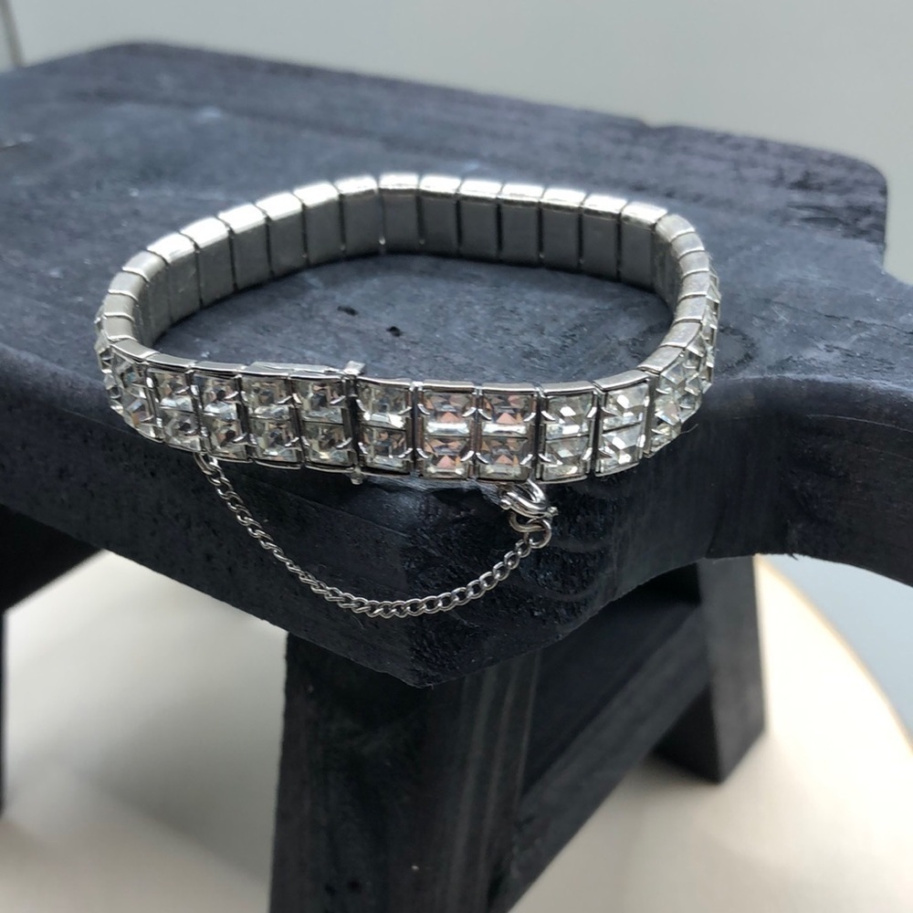 Vintage classic style double row tennis bracelet with safety chain.